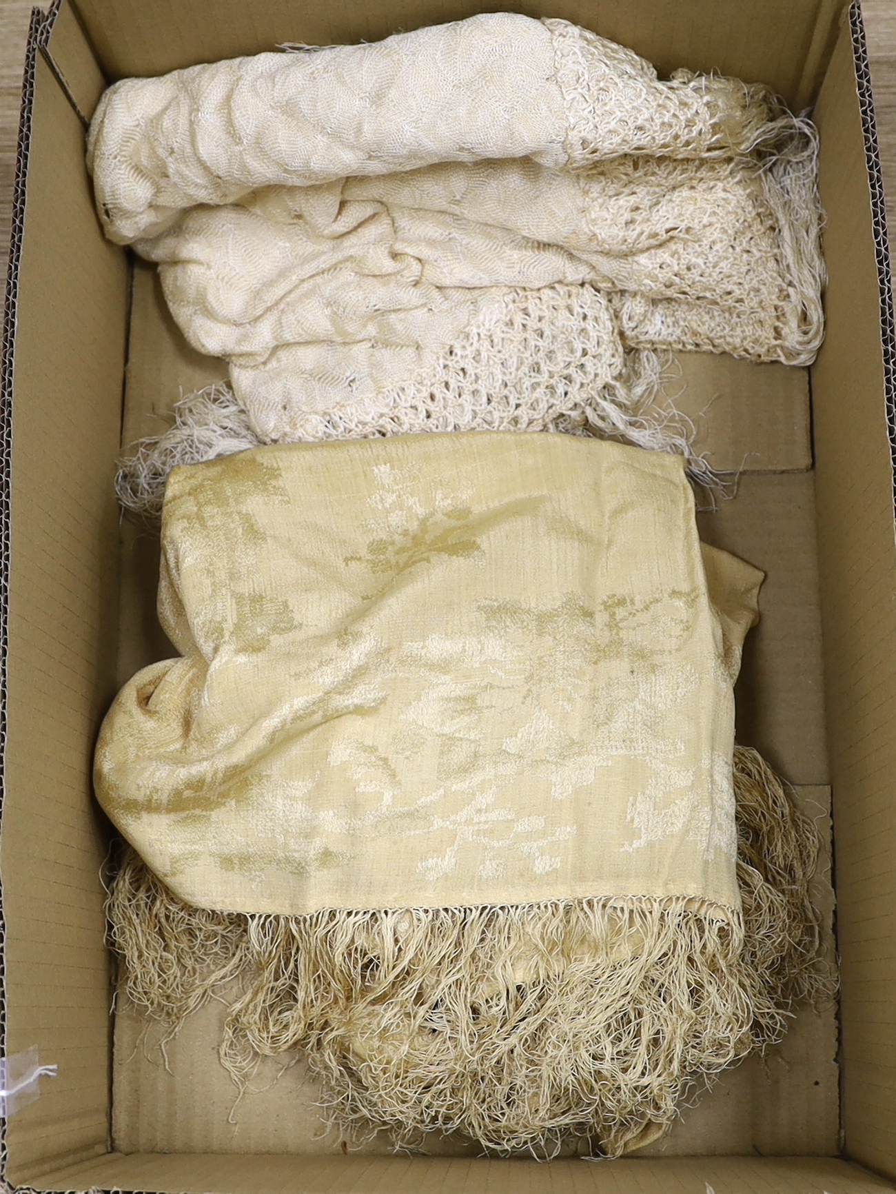 An embroidered Indian felt cover, a cream satin pageboy outfit, a white work christening gown, a silk shawl, a knitted silk shawl and a length of brocade